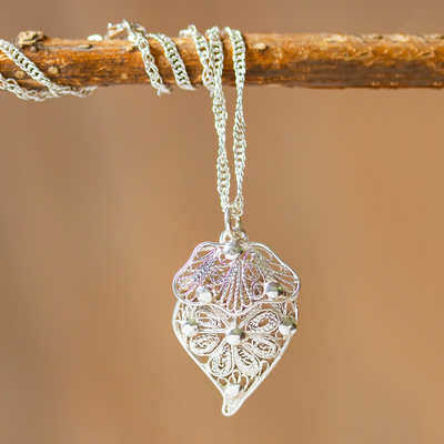 Sterling silver pendant necklace, 'Woven Heart' - Double-Heart Sterling Silver Filigree Pendant Necklace