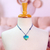 Papier mache pendant necklace, 'Sky Hummingbird' - Papier Mache Hummingbird Pendant Necklace from Mexico