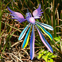Wood alebrije sculpture, 'Purple Quetzal - Artisan Crafted Bird Alebrije Sculpture