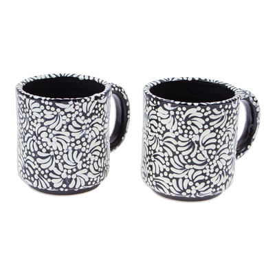 Ceramic mugs, 'Spring Shadows' (pair) - Pair of Floral Talavera Ceramic Mugs in Black from Mexico