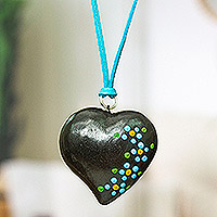 Ceramic pendant necklace, 'Heart and Harmony' - Handmade Heart-shaped Ceramic Pendant Necklace in Black