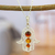 Amber pendant necklace, 'Hamsa of Courage' - 925 Sterling Silver Amber Hamsa Pendant Necklace from Mexico