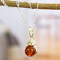 Amber pendant necklace, 'Sweet Porcupine Treasure' - 925 Sterling Silver and Amber Pendant Necklace from Mexico