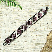 Beaded wristband bracelet, 'Peyote Flower in Plum' - Hand Beaded Bracelet from Mexico