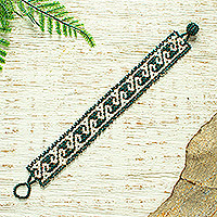 Beaded wristband bracelet, 'Guadalajara Grecas' - Handcrafted Green and White Beaded Bracelet