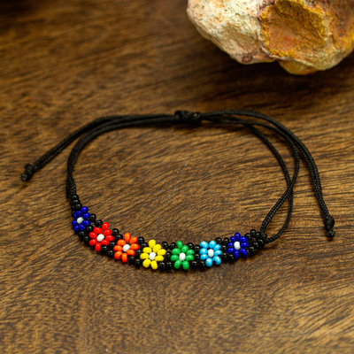 Beaded wristband bracelet, 'Floral Rainbow' - Multicoloured Beaded Wristband Bracelet Handcrafted in Mexico