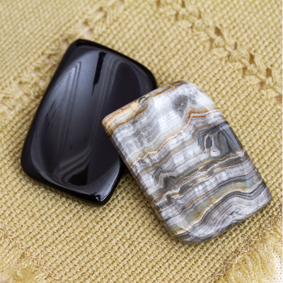 Stress-relieving stones, 'Ability Amulet' (pair) - Handcrafted Stone Amulets from Mexico (Pair)