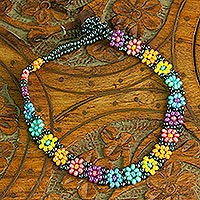 Glass beaded bracelet, 'Rainbow Sparks' - Handcrafted Glass Beaded Bracelet with Flowers