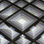 Handwoven wall art, 'Coal Divinity' - Pine Wood Handwoven Coal Wall Art with Geometric Motifs