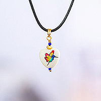 Gold-accented howlite pendant necklace, 'Fluttering Joy' - 14k Gold-Accented Howlite Pendant Necklace with Rainbow Bird