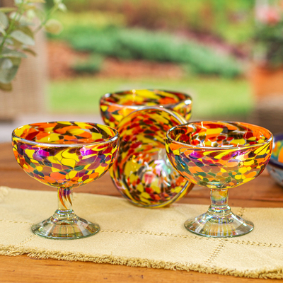 Handblown cocktail glasses, 'Intense Celebration' (set of 4) - Set of 4 Multicolor Handblown Cocktail Glasses from Mexico