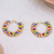 Gold-accented beaded hoop earrings, 'Rainbow Flair' - Colorful 14k Gold-Plated Brass and Glass Beads Hoop Earrings (image 2) thumbail