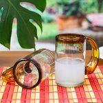 Handblown beer glasses, 'Amber Rim' (pair) - 2 Hand Blown Recycled Beer Glasses with Amber Handle and Rim