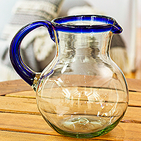 Handblown recycled glass pitcher, 'Cobalt' - Handblown Recycled Glass Pitcher with Blue Rim and Handle