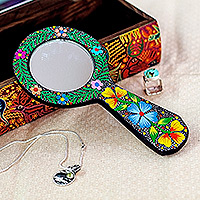 Wood hand mirror, 'Primaveral Night' - Traditional Painted Floral Copal Wood Hand Mirror in Black