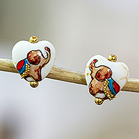 Gold-accented howlite stud earrings, 'Golden Trunks' - 14k Gold-Accented Howlite Stud Earrings with Elephant Motifs