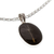 Natural flower pendant necklace, 'Nocturnal Rebirth' - Oval Black Natural Dandelion Resin Pendant Necklace
