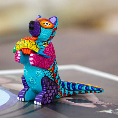 Wood alebrije figurine, 'Turquoise River Days' - Handcrafted Turquoise Copal Wood Otter and Fish Figurine