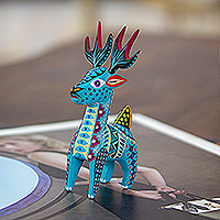 Wood alebrije figurine, 'Charming Turquoise Deer' - Copal Wood Alebrije Deer Figurine Painted in Turquoise Hues