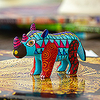 Figura de alebrije de madera, 'Aquamarine Rhino' - Figura Alebrije Rhino Copal de Madera Pintada en Aguamarina