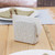 Ceramic napkin holder, 'Paradisiac Spring' - Handcrafted Floral Beige and Ivory Ceramic Napkin Holder