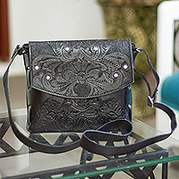 Leather sling bag, 'Midnight Palace' - Black Leather Sling Bag with Floral and Leafy Motifs