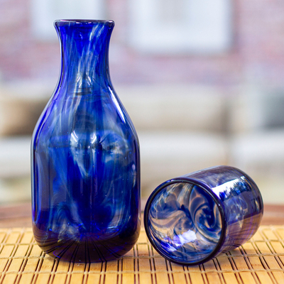 Handblown recycled glass carafe and glass set, 'Cobalt Allure' (pair) - Cobalt Handblown Recycled Glass Carafe and Cup Set (Pair)