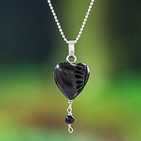 Sterling silver and ceramic pendant necklace, 'Barro Negro Romance' - Floral and Heart-Themed Barro Negro Ceramic Pendant Necklace