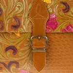 Leather sling, 'Casual Petunia' - Embossed Floral Copper-Toned Leather Sling from Mexico