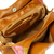 Leather shoulder bag, 'Casual Alyssum' - Embossed Floral Copper-Toned Leather Shoulder Bag