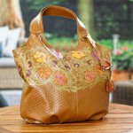 Leather handbag, 'Casual Carnation' - Embossed Floral Copper-Toned Leather Handbag