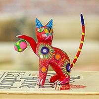Wood alebrije figurine, 'Feline Sport in Scarlet' - Painted Scarlet Copal Wood Alebrije Cat Figurine with Ball