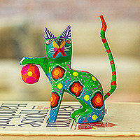 Figura de alebrije de madera, 'Feline Sport in Green' - Figura de gato Alebrije de madera de copal pintada de verde con pelota
