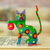 Alebrije-Figur aus Holz - Bemalte Alebrije-Katzenfigur aus grünem Copalholz mit Ball