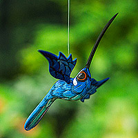 Wood alebrije ornament, 'Cyan Flight' - Painted Cyan Copal Wood Alebrije Hummingbird Oornament