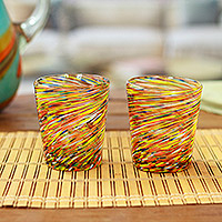 Handblown juice glasses, 'Rainbow Centrifuge' (pair) - Eco-Friendly Handblown Multicolor Juice Glasses (Pair)