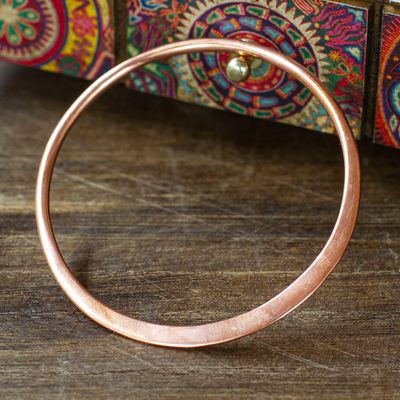 Copper bangle bracelet, 'Delightful Charm' - Modern Polished Copper Bangle Bracelet Crafted in Mexico