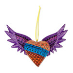 Wood alebrije ornament, 'Purple Wings of the Heart' - Hand-Painted Copal Wood Winged Heart Ornament in Purple