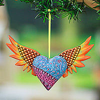 Wood alebrije ornament, 'Orange Wings of the Heart' - Hand-Painted Copal Wood Winged Heart Ornament in Orange