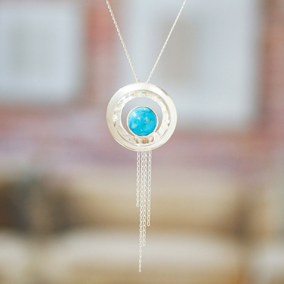 Sterling silver pendant necklace, 'Lagoon Glance' - Hammered and Polished Recon Turquoise Pendant Necklace