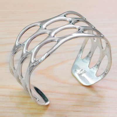 Sterling silver cuff bracelet, 'Oval Splendor' - Taxco Sterling Silver Cuff Bracelet with Openwork Accents