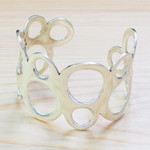 Sterling silver cuff bracelet, 'Bubbly Sides' - Bubble-Patterned Sterling Silver Cuff Bracelet from Mexico