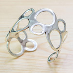 Sterling silver cuff bracelet, 'Bubbly Sides' - Bubble-Patterned Sterling Silver Cuff Bracelet from Mexico