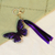 Wood keychain and bag charm, 'Monarchs of Hope' - Hand-Painted Wood Butterfly Keychain and Bag Charm in Purple