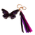 Wood keychain and bag charm, 'Monarchs of Hope' - Hand-Painted Wood Butterfly Keychain and Bag Charm in Purple