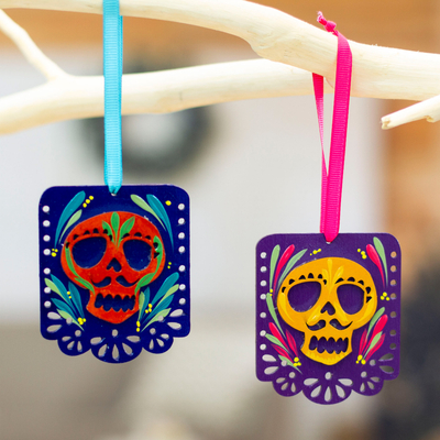 Wood ornaments, 'Mexican Custom' (pair) - 2 Colorful Hand-Painted Wood Day of the Dead Skull Ornaments