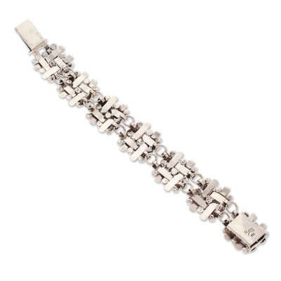 Sterling silver link bracelet, 'Braided Gala' - Polished Taxco Sterling Silver Link Bracelet from Mexico