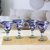 Handblown recycled glass martini glasses, 'Cobalt Swirls' (set of 4) - Eco-Friendly Set of 4 Handblown Blue Swirl Martini Glasses (image 2) thumbail
