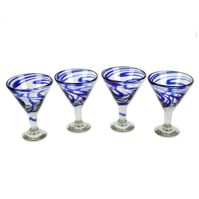 Handblown recycled glass martini glasses, 'Cobalt Swirls' (set of 4) - Eco-Friendly Set of 4 Handblown Blue Swirl Martini Glasses
