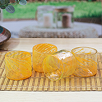 Blown recycled glass juice glasses, 'Marigold Relaxation' (set of 4) - 4 Hand Blown Orange Recycled Glass Juice Glasses from Mexico